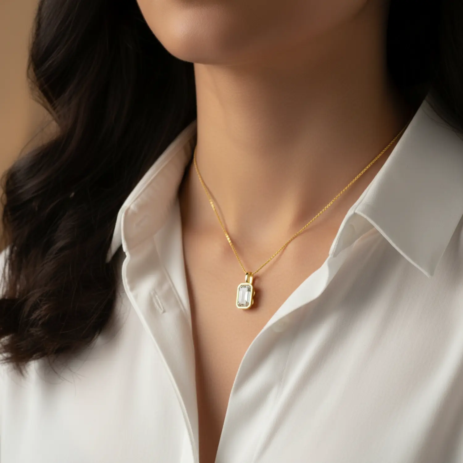 14K Gold Emerald Cut Moissanite Bezel Pendant in yellow gold