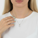 14k gold pear shape moissanite necklace in white gold