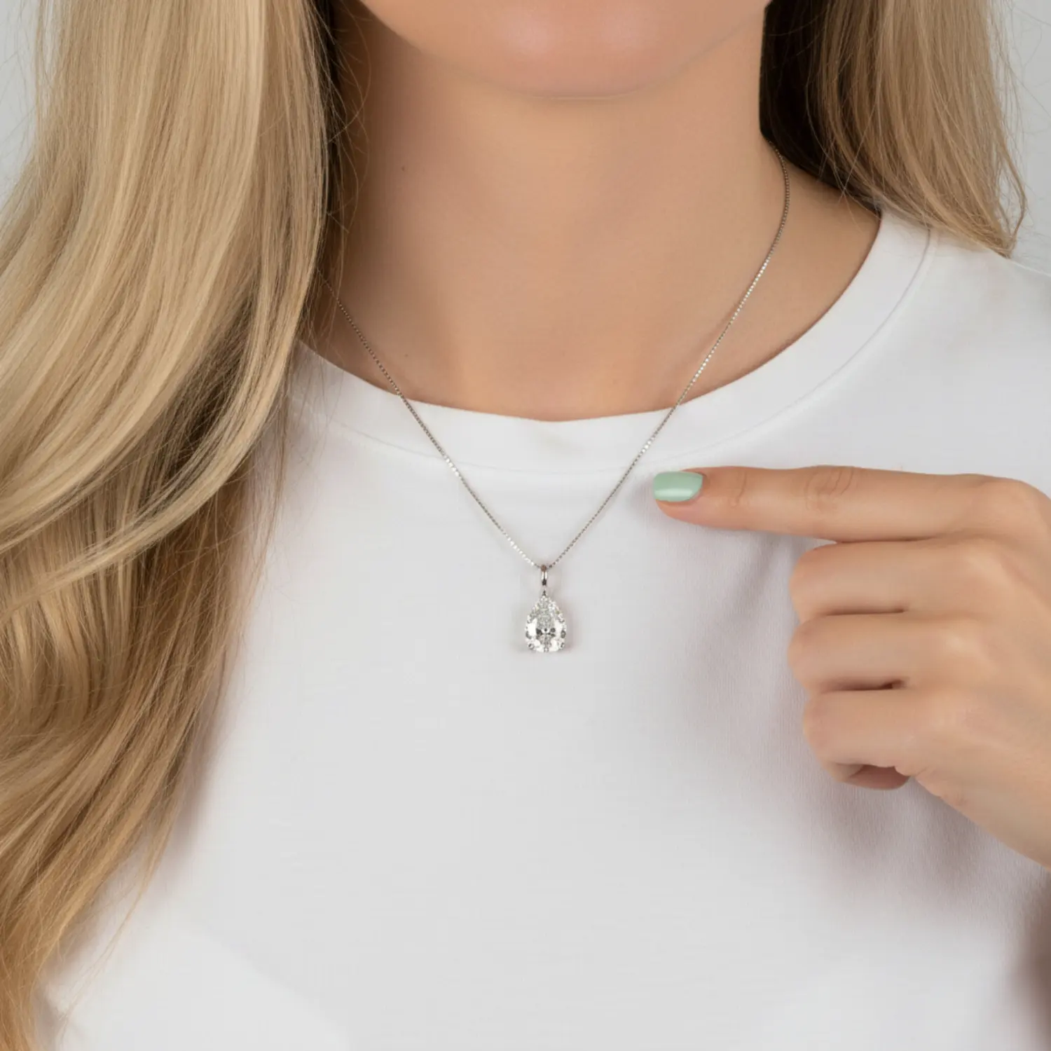 14k gold pear shape moissanite necklace in white gold