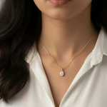 14K Gold Half Bezel Oval Shaped Moissanite Pendant Necklace close up, Adora Fine Jewelry