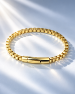 Men's stainless steel box link chain bracelet, 18K gold plated, styled in sunlight