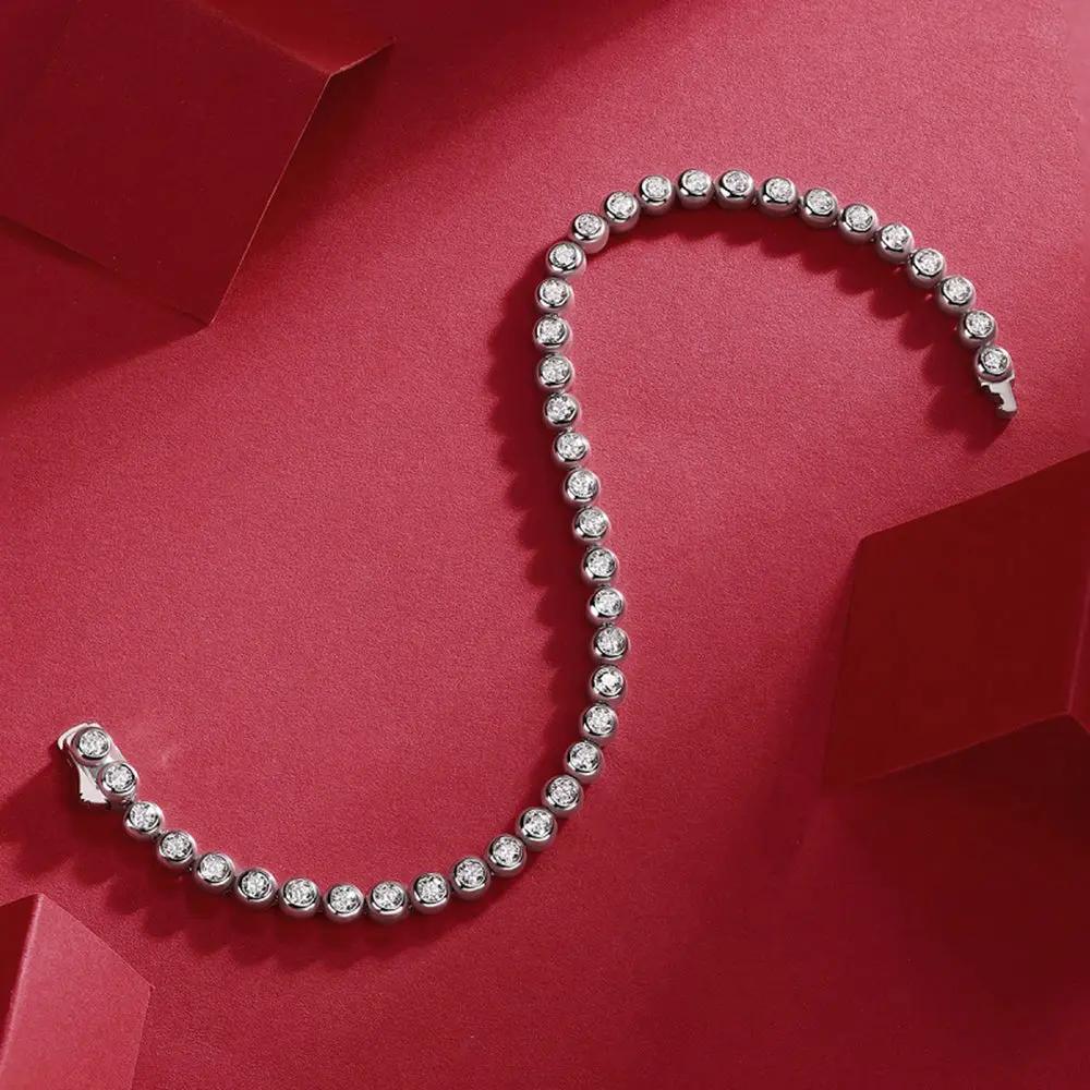 2mm 1.59 CTW Moissanite Tennis Bracelet - 14K Yellow Gold Plated over 925 Sterling Silver Adora Fine Jewelry