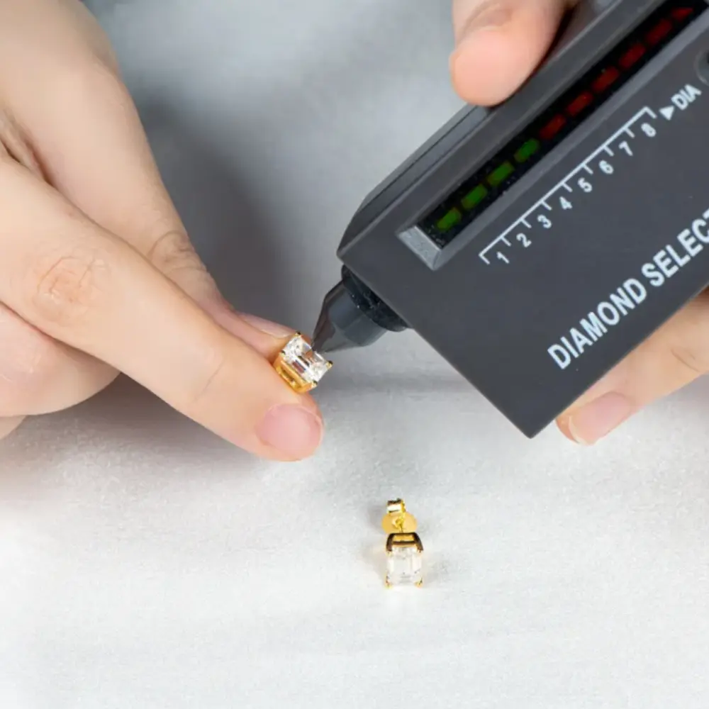 2 CTW Moissanite Stud Earrings | Emerald Cut | D VVS1 | 14K Gold Plated Over Sterling Silver | Adora Fine Jewelry Adora Fine Jewelry