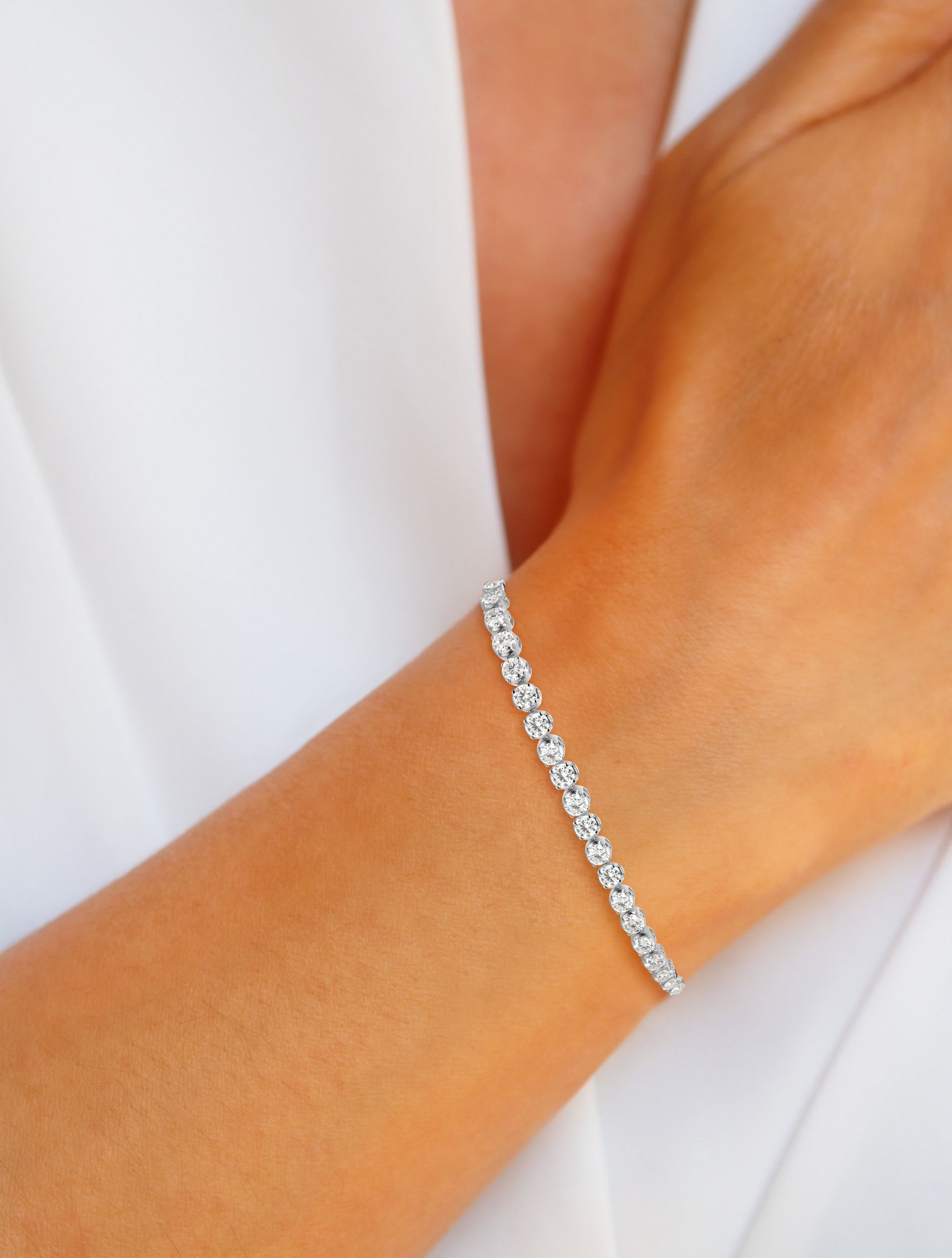 Tennis Bracelet | Moissanite | 4.0 mm | Round Setting | 7.0 Inches | 925 Sterling Silver with Platinum Plating or 24K Gold Plating - Adora Fine Jewelry